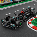 Model of a Formula 1 car with 'Petronas' branding on a transparent background