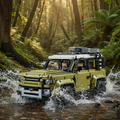 Toy model of a Land Rover Defender on a white background