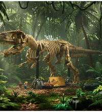 A large assembled T-rex skeleton model on black display stands, with a small plaque, rocks, and two small minifigures on a plain white background. The construction appears tan and beige with black stand supports.