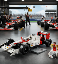 A building block set of a white and red Formula 1 race car on a display stand, shown with a small minifigure and accessories on a white background.