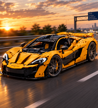 A yellow and black building-block toy sports car resembling a McLaren P1, shown on a white background with a small black accessory case and a printed McLaren P1 card.