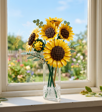 A bouquet of LEGO sunflowers with green leaves and stems, isolated on a white background.